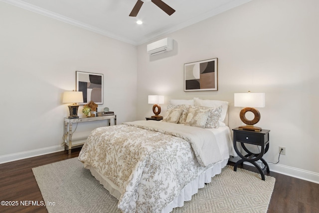 bedroom featuring dark wood-type flooring, ornamental molding, baseboards, and a wall mounted AC