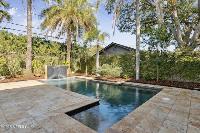 pool with a patio