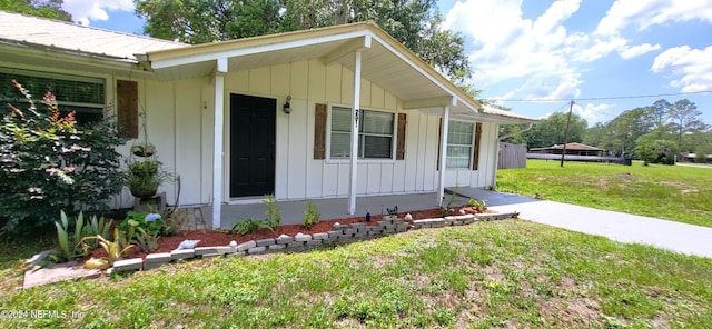 exterior space with a yard