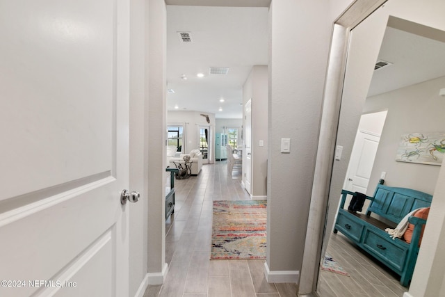 hallway featuring light hardwood / wood-style flooring