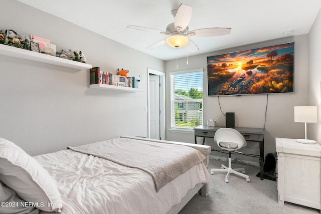 carpeted bedroom featuring ceiling fan