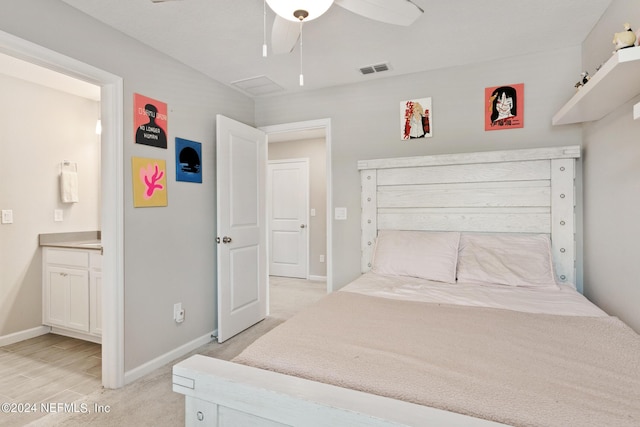 bedroom featuring ceiling fan and light colored carpet