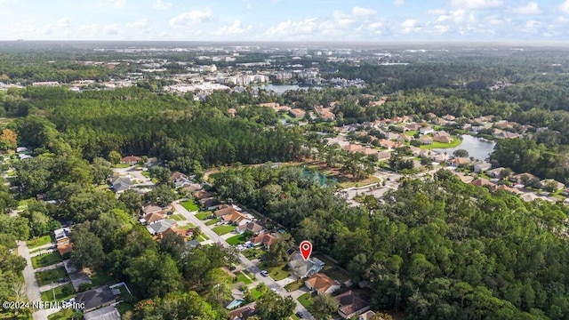 drone / aerial view with a water view