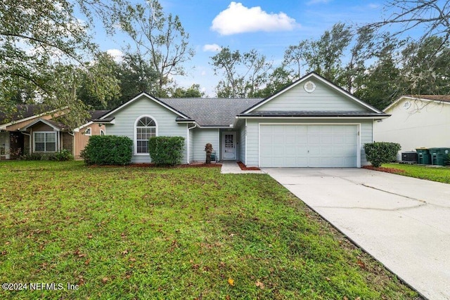 ranch-style house with central AC, a front yard, and a garage