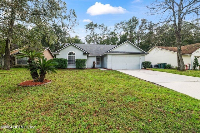 ranch-style house featuring a front yard and a garage