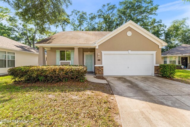 ranch-style home with a garage