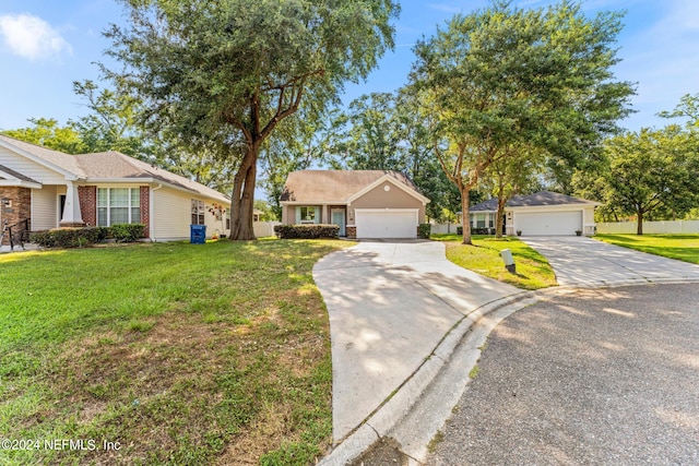 ranch-style house with a garage and a front yard