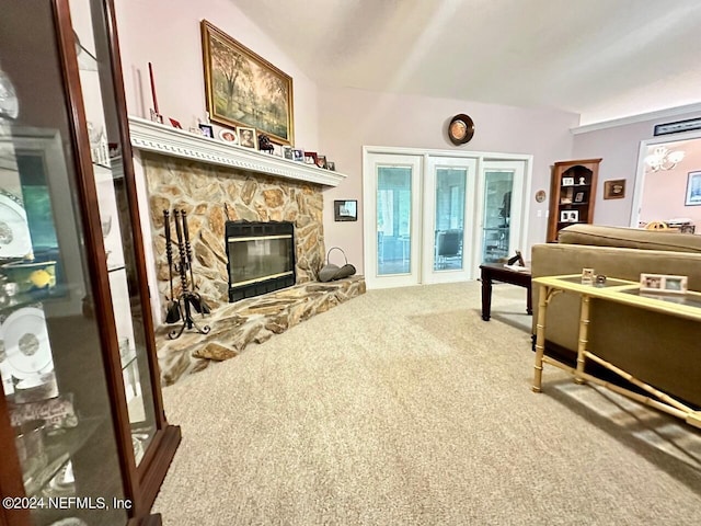 carpeted living room with a fireplace