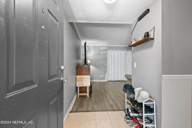 foyer entrance featuring light tile patterned floors