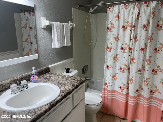 full bathroom featuring vanity, tile patterned floors, toilet, and shower / bath combo