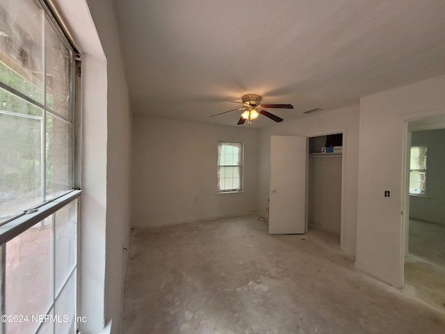 unfurnished bedroom featuring ceiling fan