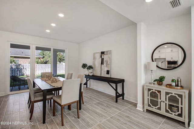 dining room with light wood-type flooring