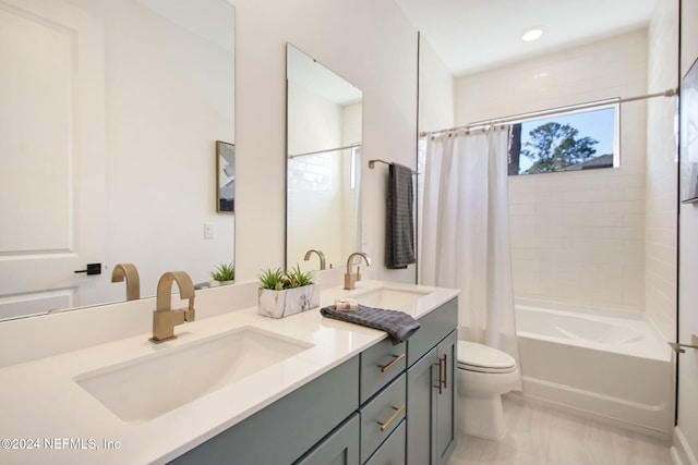 full bathroom with tile patterned floors, vanity, shower / bath combo, and toilet