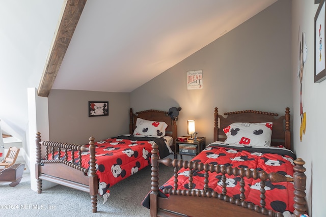 carpeted bedroom with vaulted ceiling