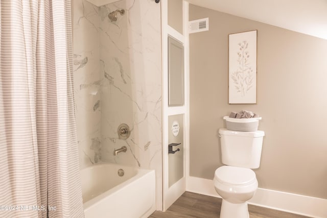 bathroom with shower / bath combination with curtain, lofted ceiling, toilet, and hardwood / wood-style flooring