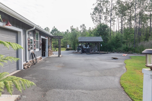 view of patio / terrace with a garage