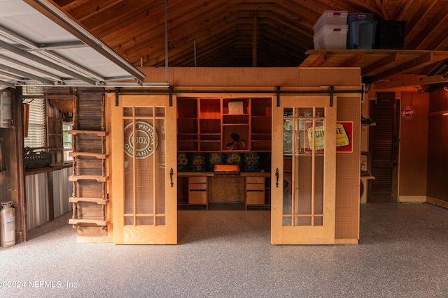 basement featuring a barn door