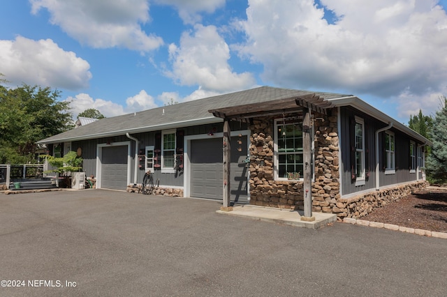 view of front of home with a garage