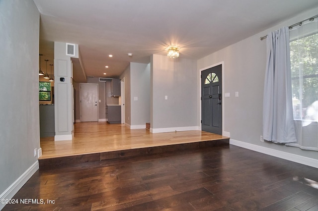 entryway with wood-type flooring