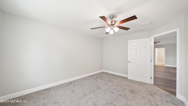 unfurnished room featuring carpet flooring