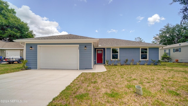 single story home featuring a front yard and a garage