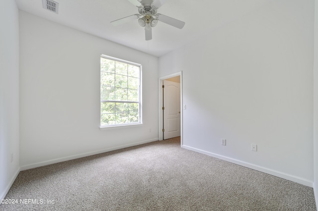 unfurnished room with carpet floors and ceiling fan