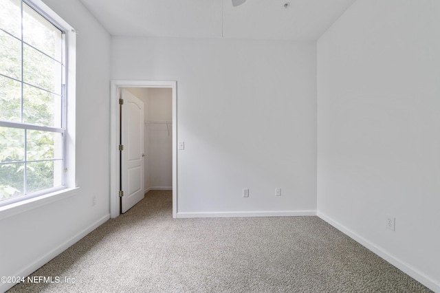 unfurnished room featuring carpet floors