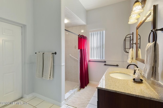 bathroom featuring tile patterned floors, vanity, and a shower with shower curtain