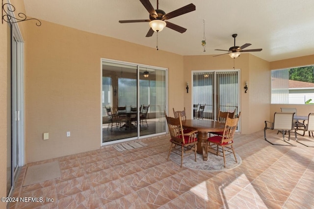 view of patio featuring ceiling fan