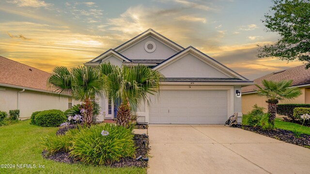 view of front of home featuring a garage