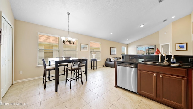 kitchen featuring a chandelier, light tile flooring, dishwasher, hanging light fixtures, and sink