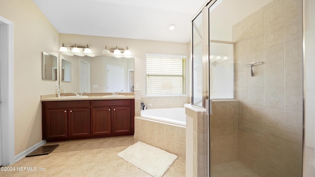 bathroom featuring independent shower and bath, double sink, and oversized vanity