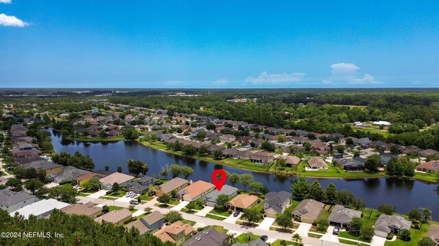 drone / aerial view featuring a water view