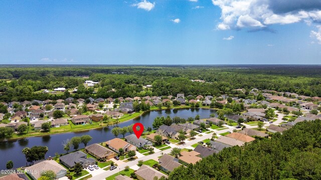 bird's eye view with a water view