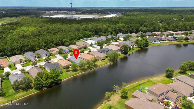 drone / aerial view featuring a water view