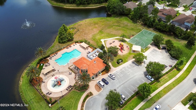 birds eye view of property featuring a water view