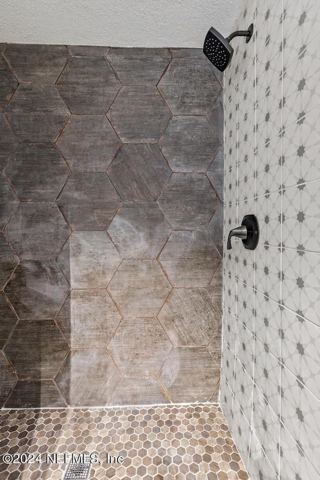 room details with a tile shower