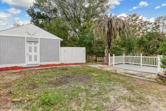 view of yard with a deck