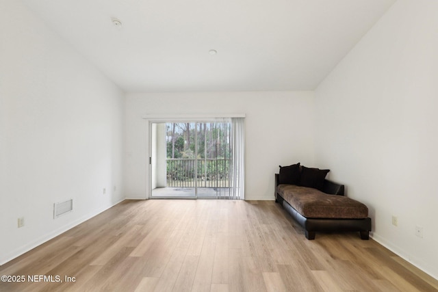 living area featuring light hardwood / wood-style floors