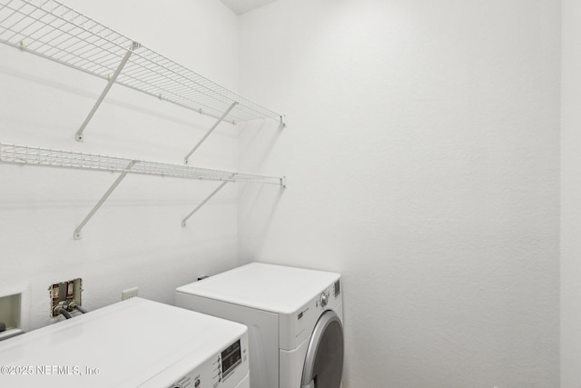 laundry area featuring washer / dryer