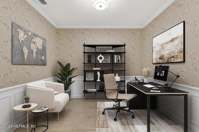 office space featuring crown molding, wood-type flooring, and a textured ceiling