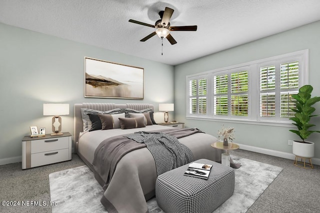 bedroom with ceiling fan and light colored carpet