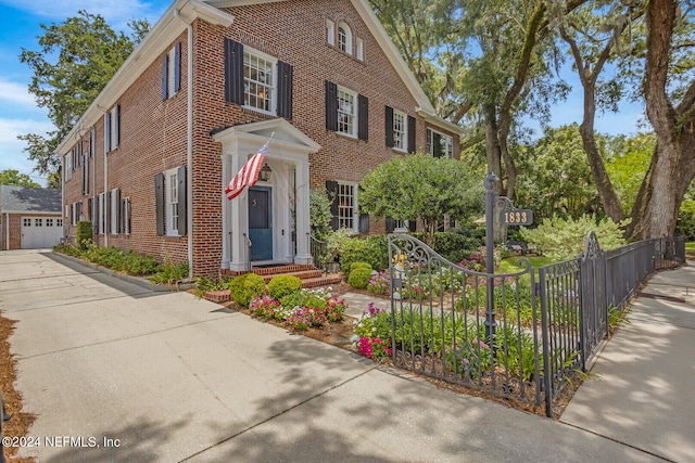 view of front of property with a garage