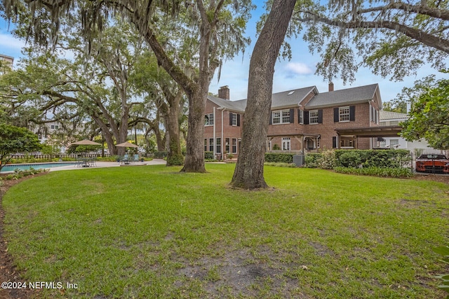 exterior space with a front yard