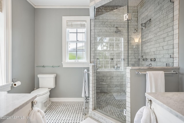 bathroom featuring walk in shower, ornamental molding, tile floors, vanity, and toilet