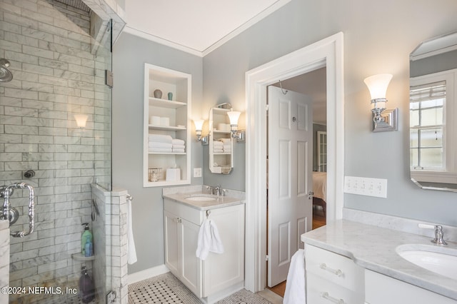 bathroom with tile floors, an enclosed shower, crown molding, and vanity