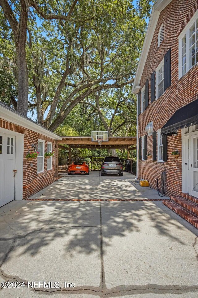 exterior space featuring a carport