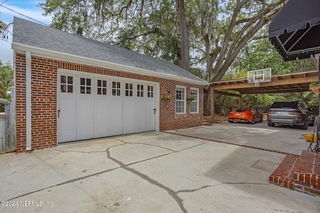 garage with a carport