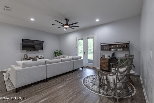 living room with ceiling fan, dark wood-type flooring, and french doors