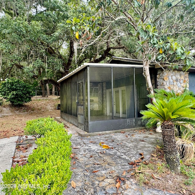 view of shed / structure with a sunroom